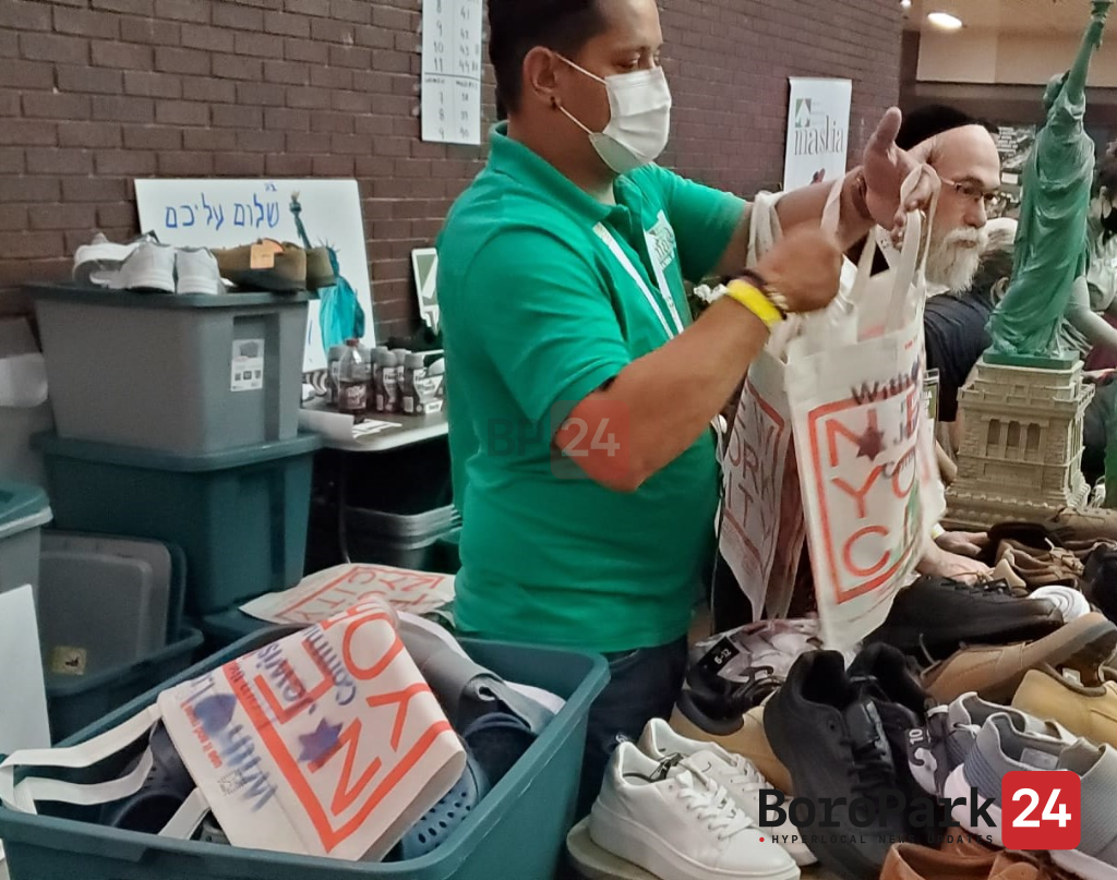 Masbia Welcomes 200 Migrants to NYC this Morning with Smiles, Shoes, and Socks